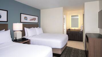 Suite, plusieurs lits | 1 chambre, literie de qualité supérieure, surmatelas, bureau