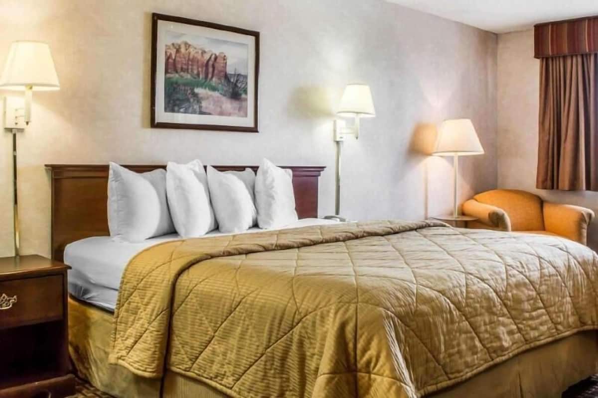 Premium bedding, pillowtop beds, laptop workspace, blackout drapes