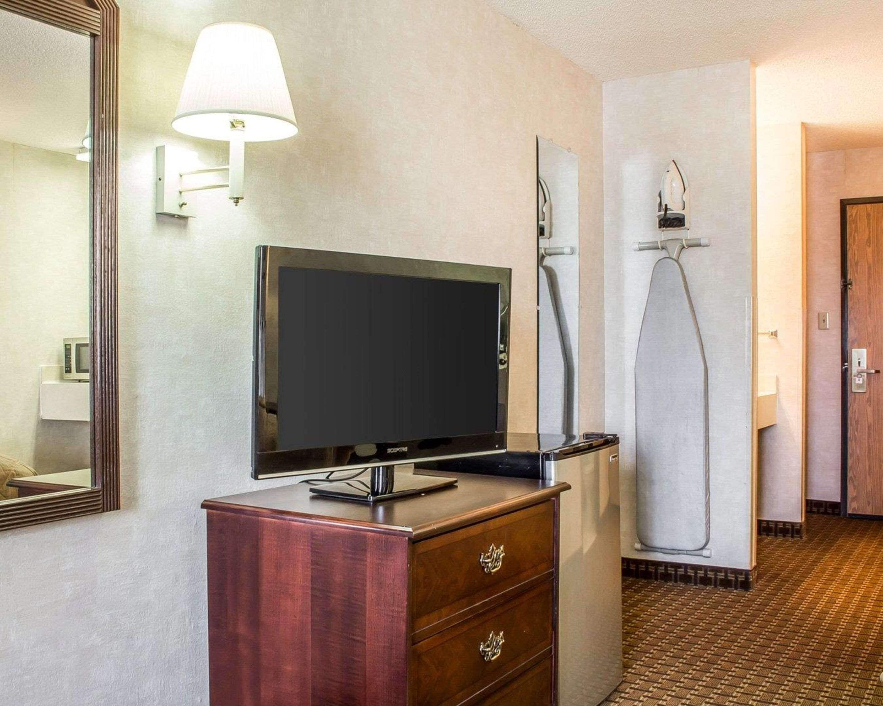 Premium bedding, pillow-top beds, laptop workspace, blackout curtains