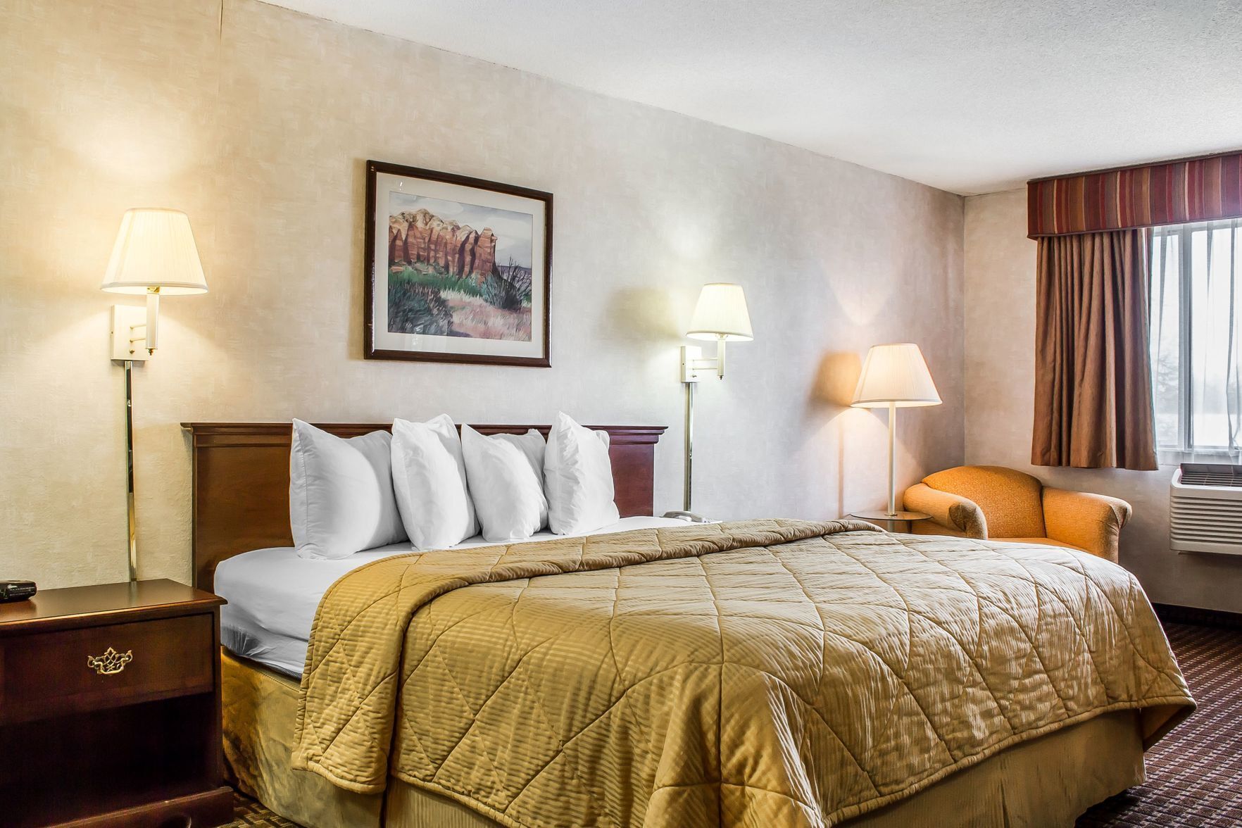 Premium bedding, pillowtop beds, laptop workspace, blackout drapes