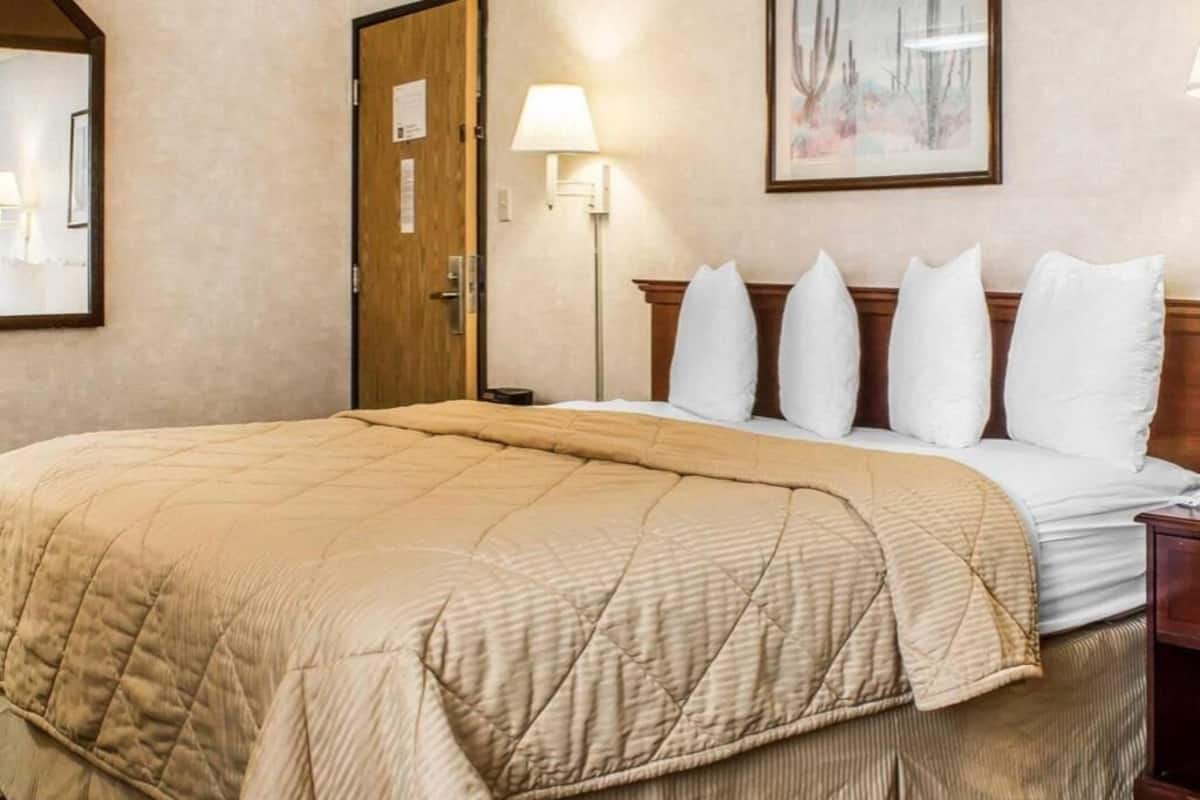 Premium bedding, pillowtop beds, laptop workspace, blackout drapes