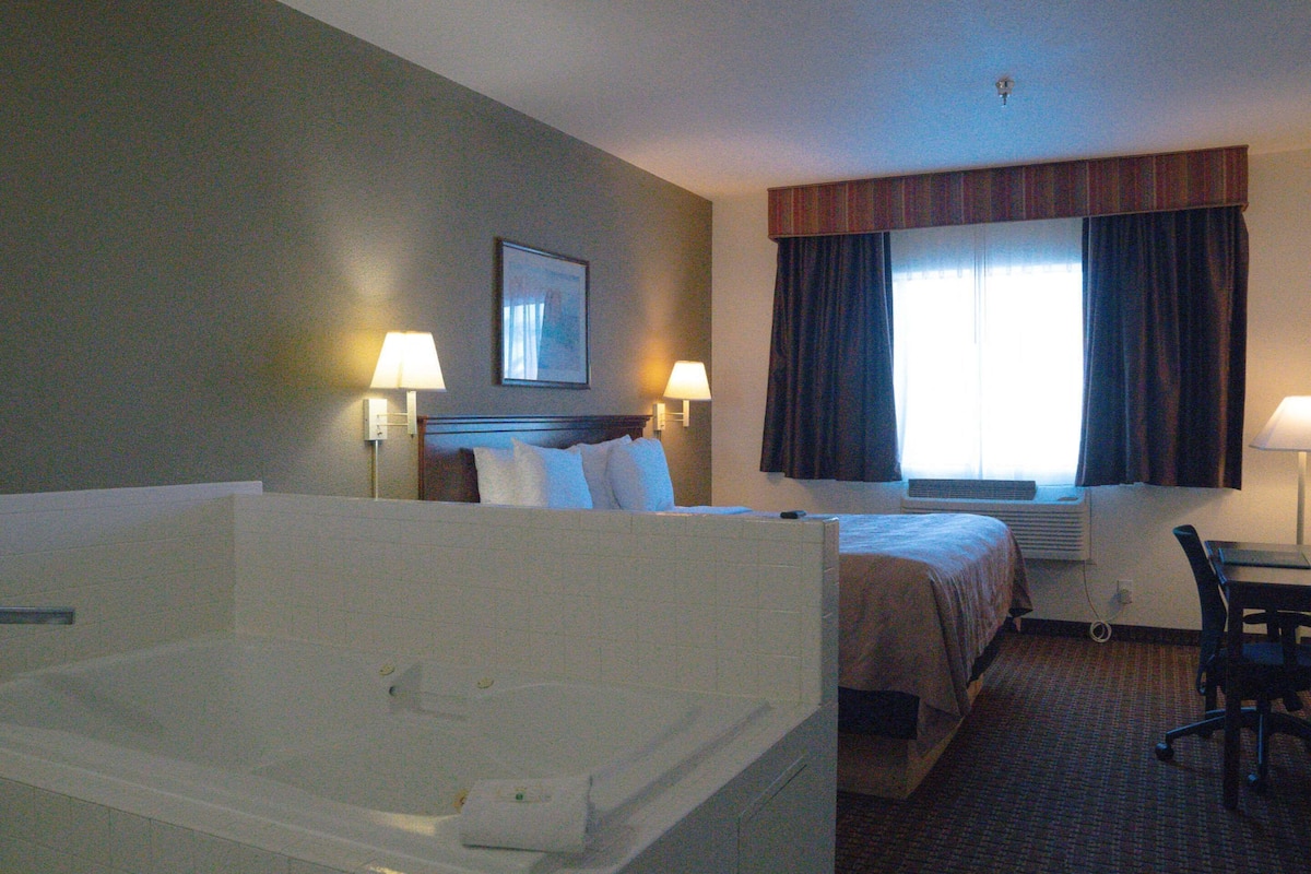 Suite, 1 King Bed, Non Smoking | Premium bedding, pillow-top beds, laptop workspace, blackout curtains