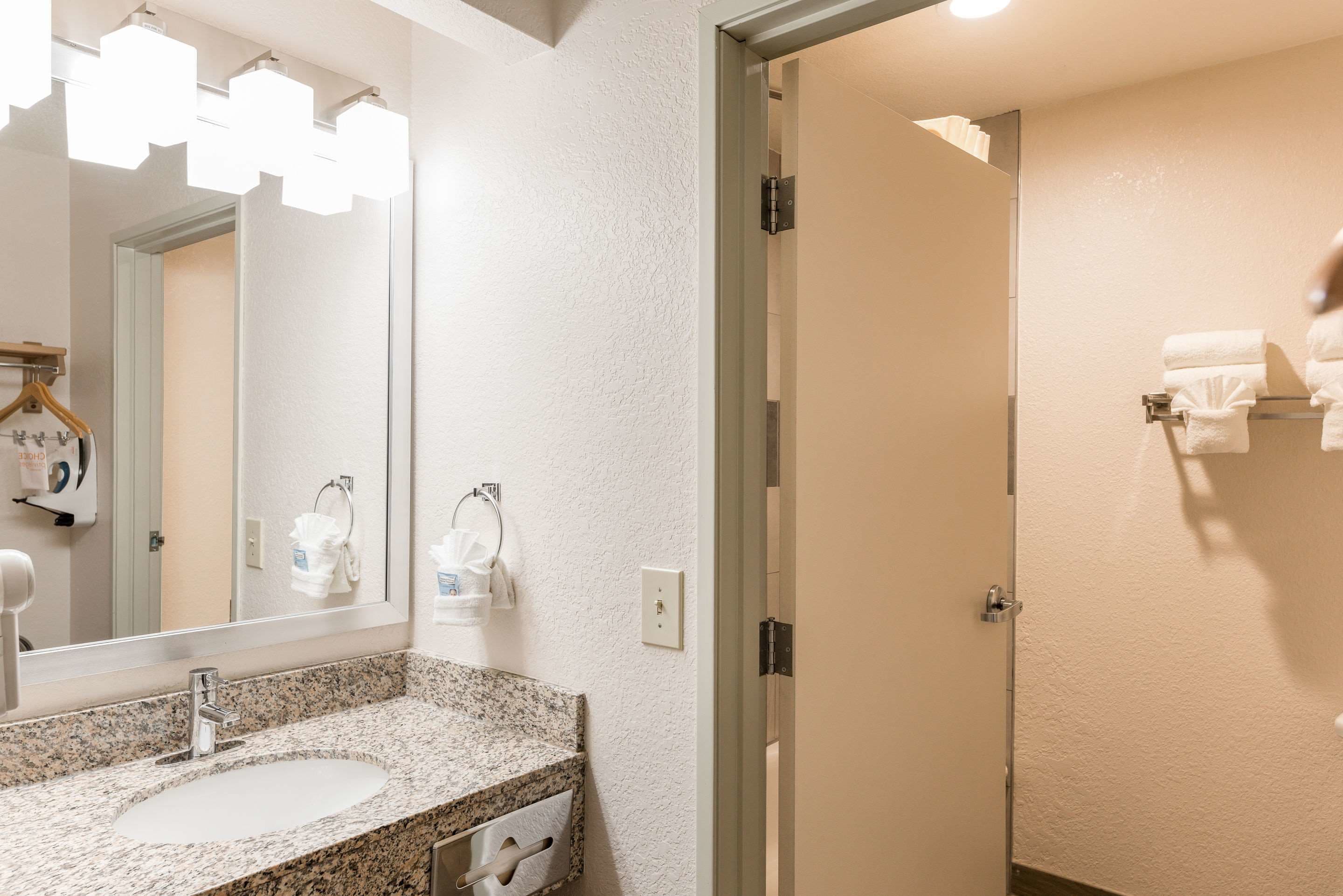 desk, blackout curtains, iron/ironing board, free cots/infant beds