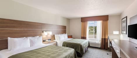 Desk, blackout drapes, iron/ironing board, free cribs/infant beds