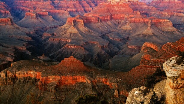 A canyon landscape with layered rock formations. - Ramada by Wyndham Williams/Grand Canyon Area (Williams)