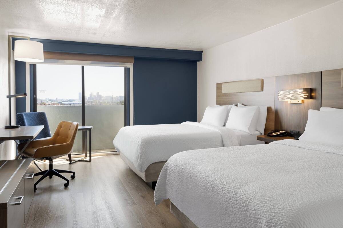 Premium bedding, pillowtop beds, desk, laptop workspace