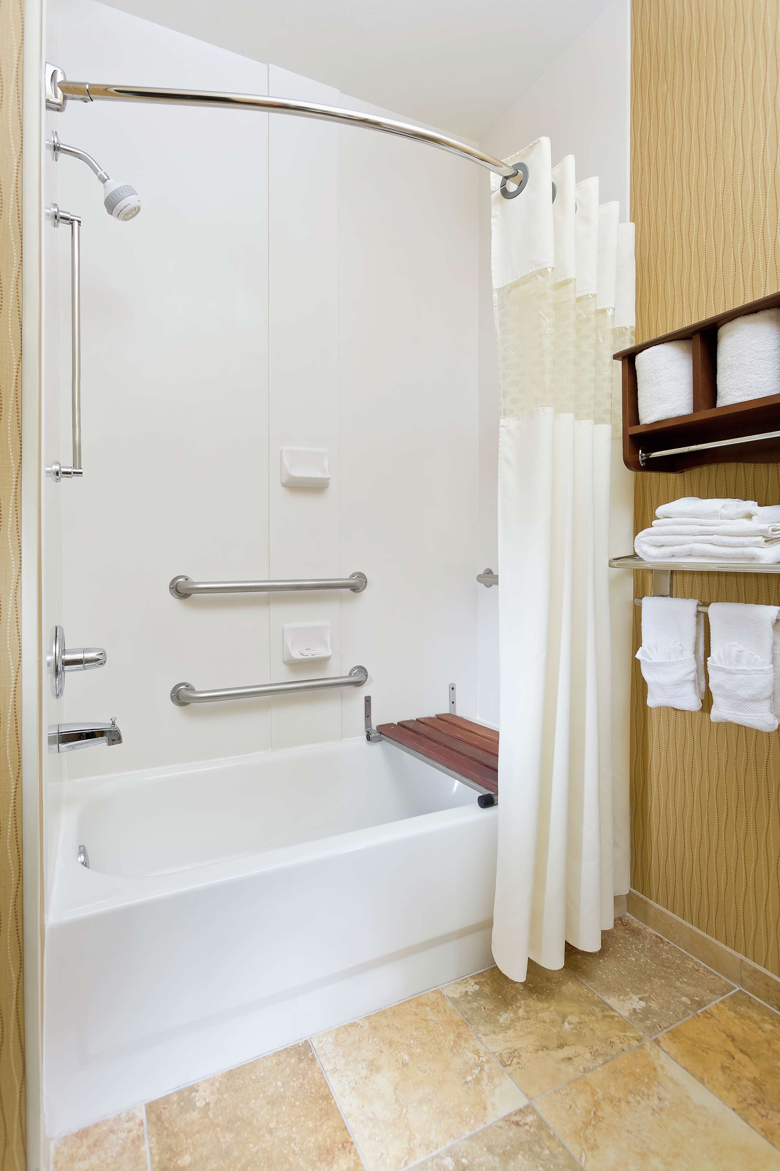 combined shower/bathtub, free toiletries, hair dryer, towels