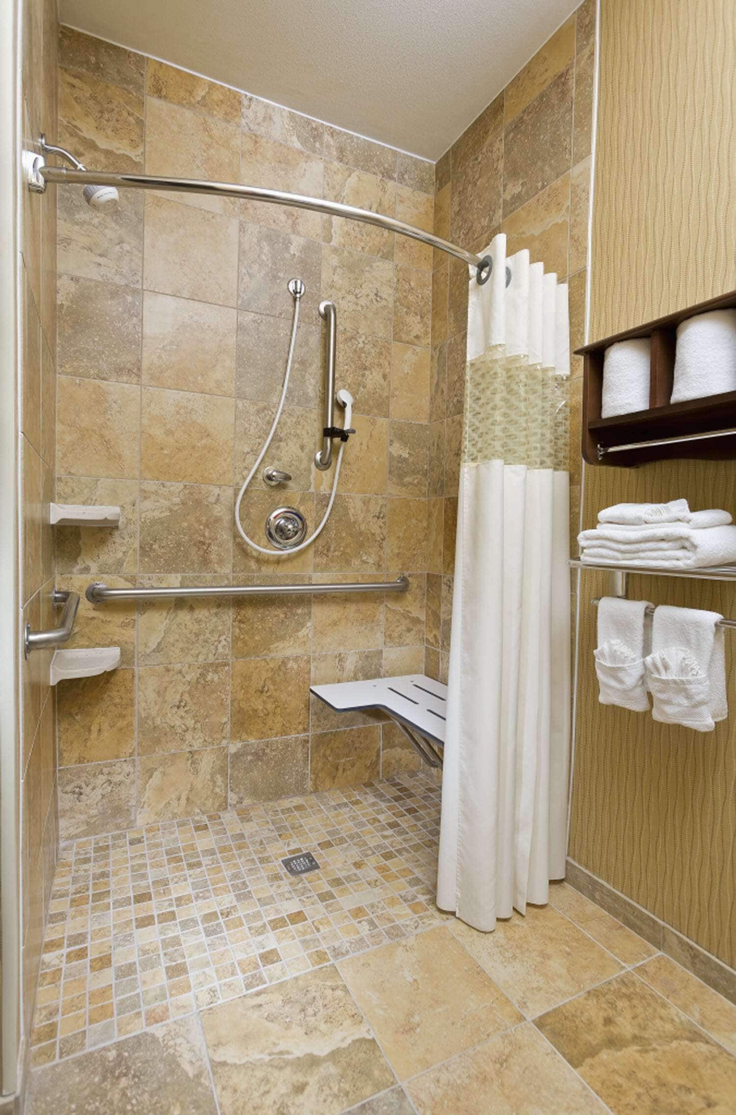 room, 1 king bed, accessible, non smoking | bathroom | combined shower/bathtub, free toiletries, hair dryer, towels