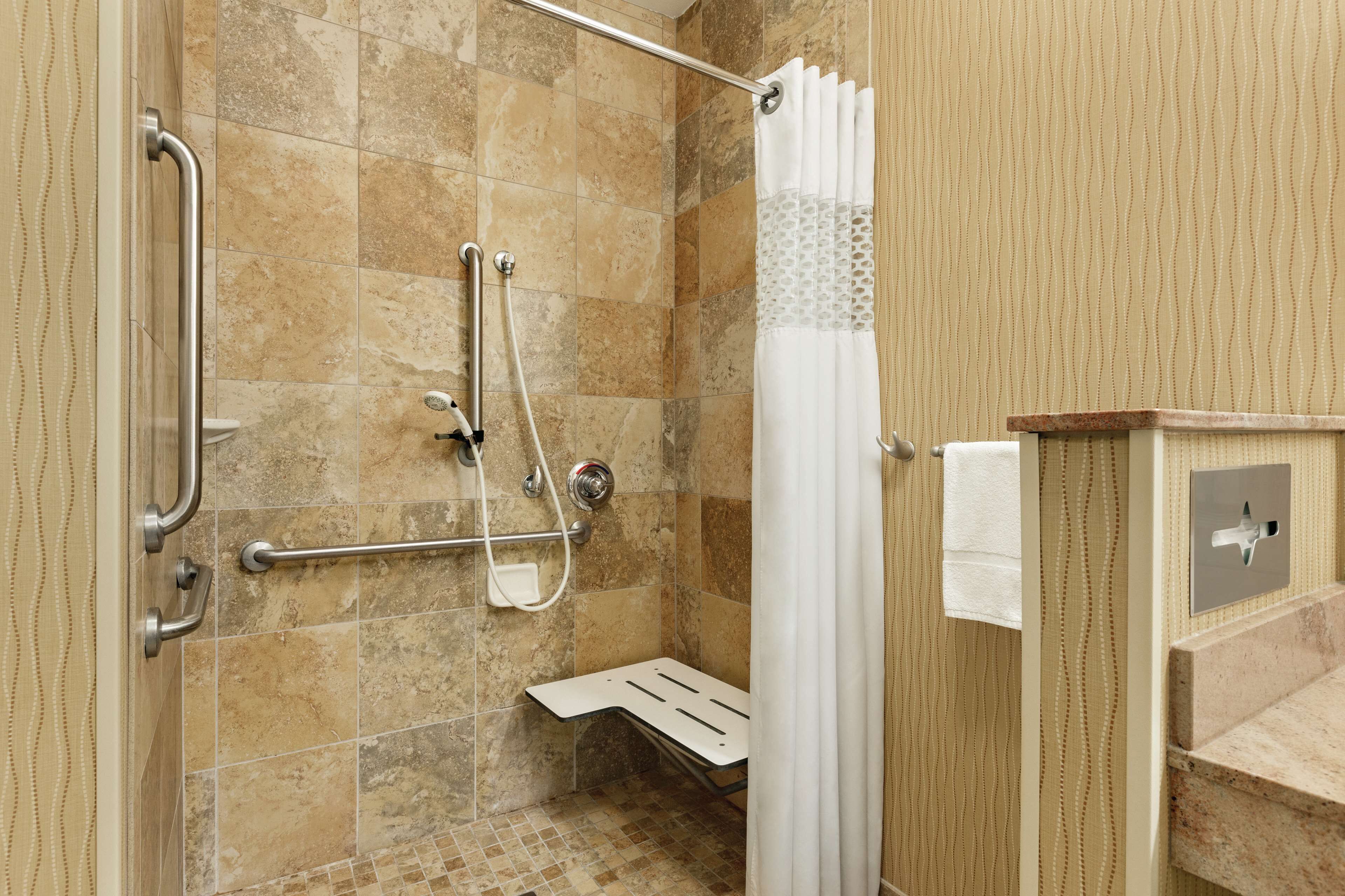 room, 1 king bed, accessible, non smoking | bathroom | combined shower/bathtub, free toiletries, hair dryer, towels