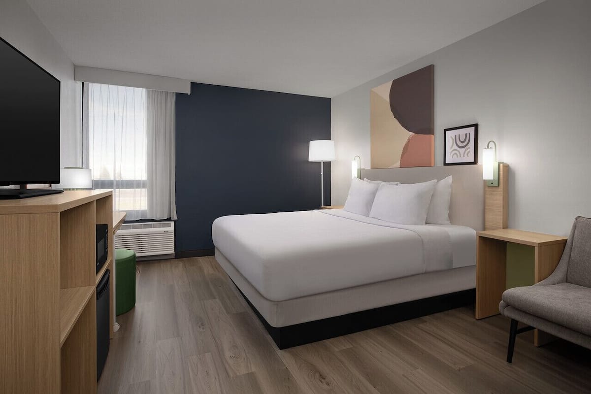 Room, 1 King Bed | Desk, laptop workspace, iron/ironing board, free cots/infant beds