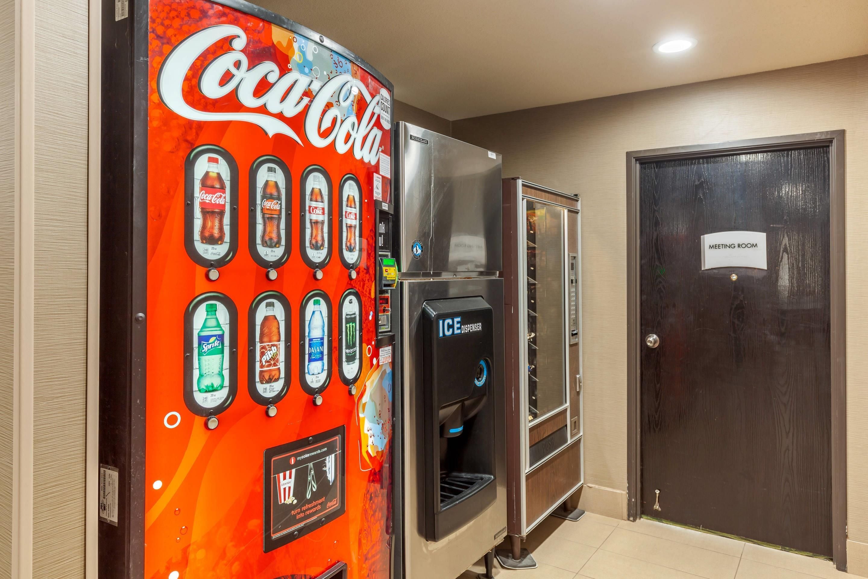 A vending machine with various drink options including Coca-Cola, Sprite, and Dasani.