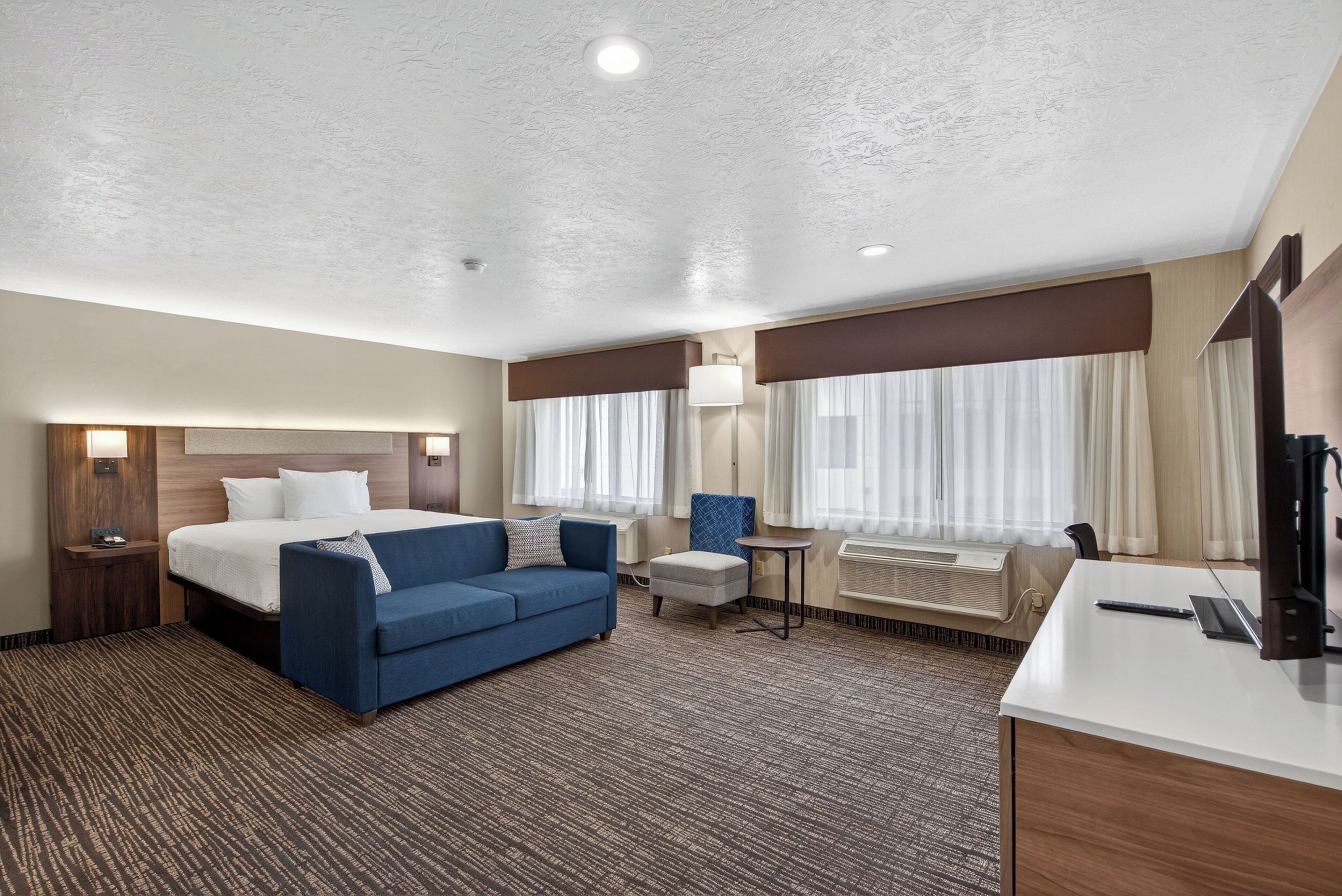 Habitación ejecutiva, 1 cama de matrimonio grande, no fumadores, frigorífico | Colchones con acolchado adicional, caja fuerte, escritorio