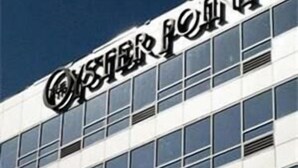 A modern building with a sign that reads "YINGDAI" in large letters.