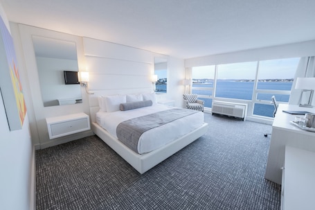 Hypo-allergenic bedding, down comforters, in-room safe, blackout drapes. The Oyster Point Hotel