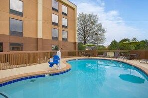Outdoor pool, open 7:00 AM to 10:00 PM, sun loungers