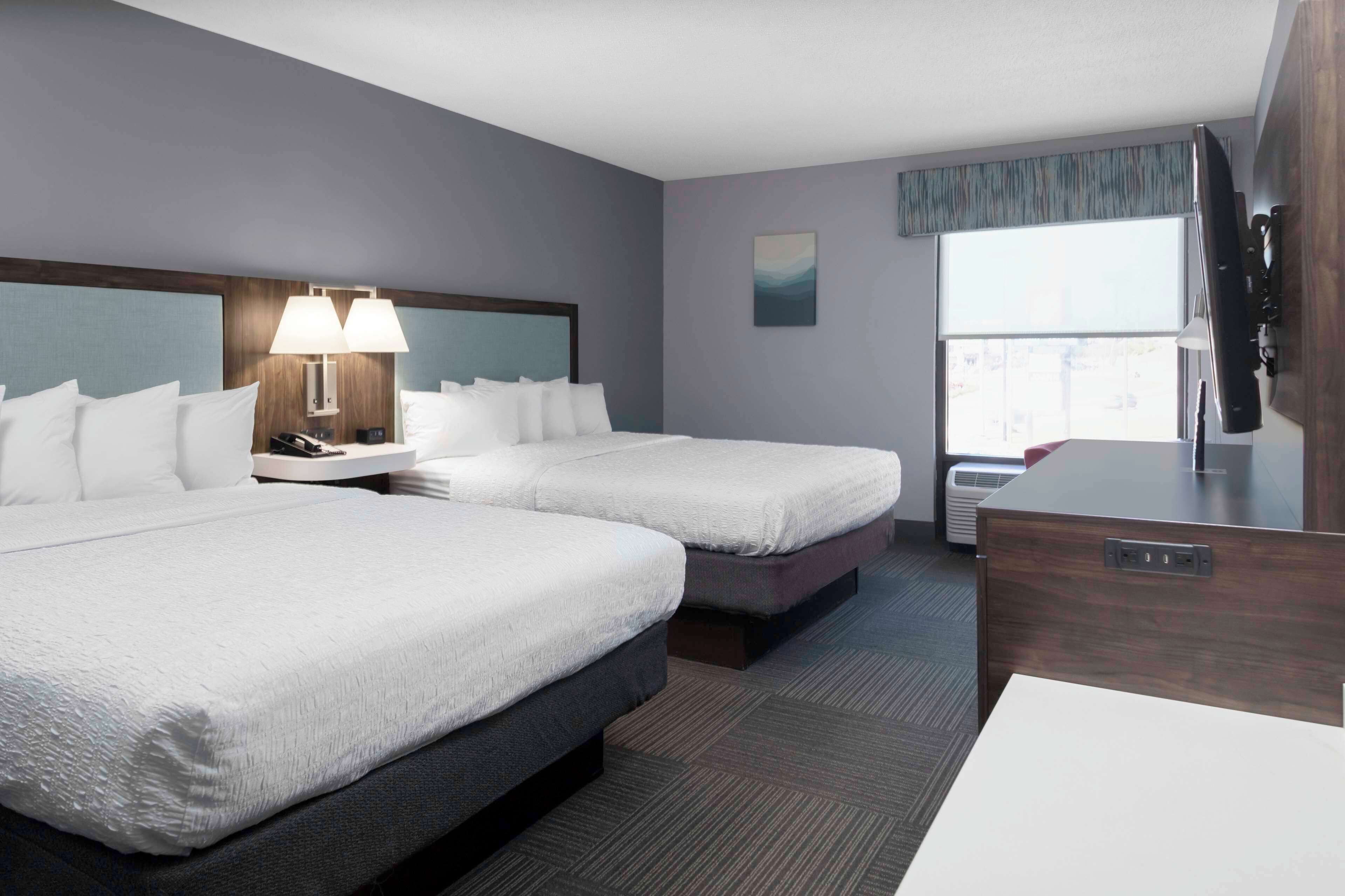 two queen beds non smoking | in-room safe, iron/ironing board, free cots/infant beds, free wifi