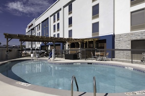 Outdoor pool, open 7:00 AM to 10:00 PM, sun loungers
