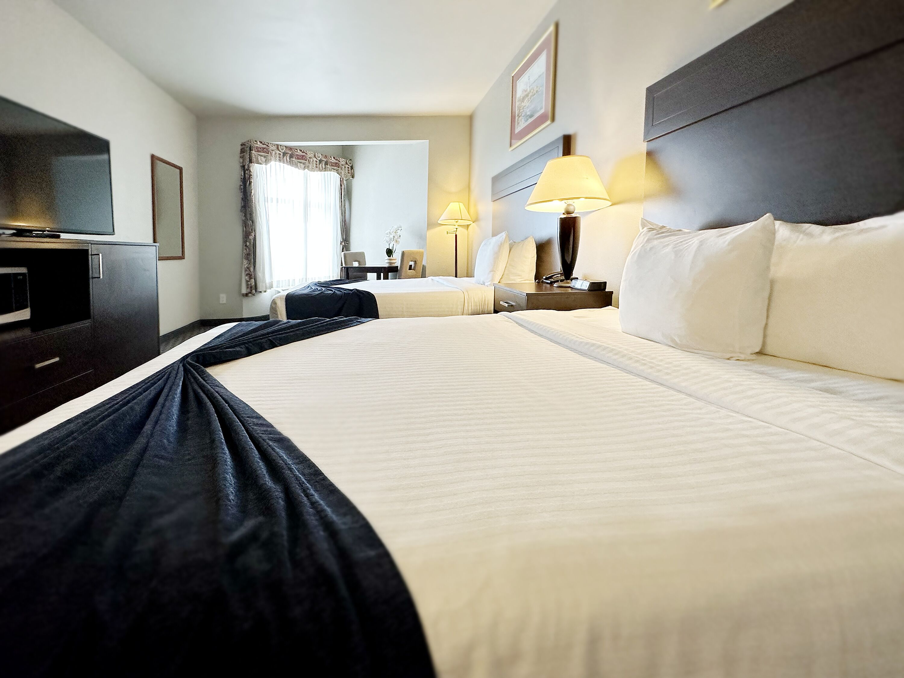 queen room with two queen beds | 1 bedroom, desk, iron/ironing board, free wifi