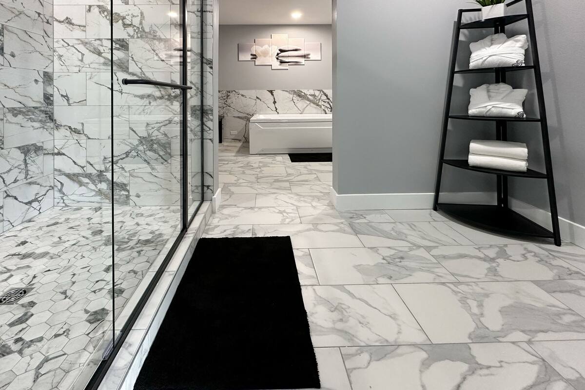 family suite with jacuzzi | bathroom | hair dryer, towels