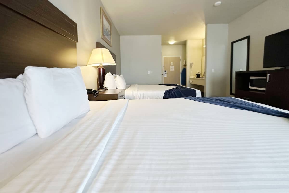 queen room with two queen beds | 1 bedroom, desk, iron/ironing board, free wifi