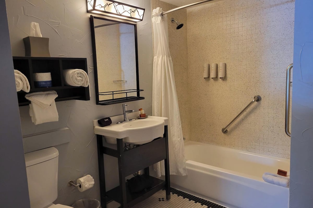 combined shower/bathtub, free toiletries, hair dryer, bathrobes