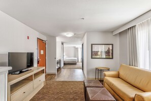 Suite, 1 Bedroom | Living area | 39-inch LCD TV with cable channels, TV, iPod dock