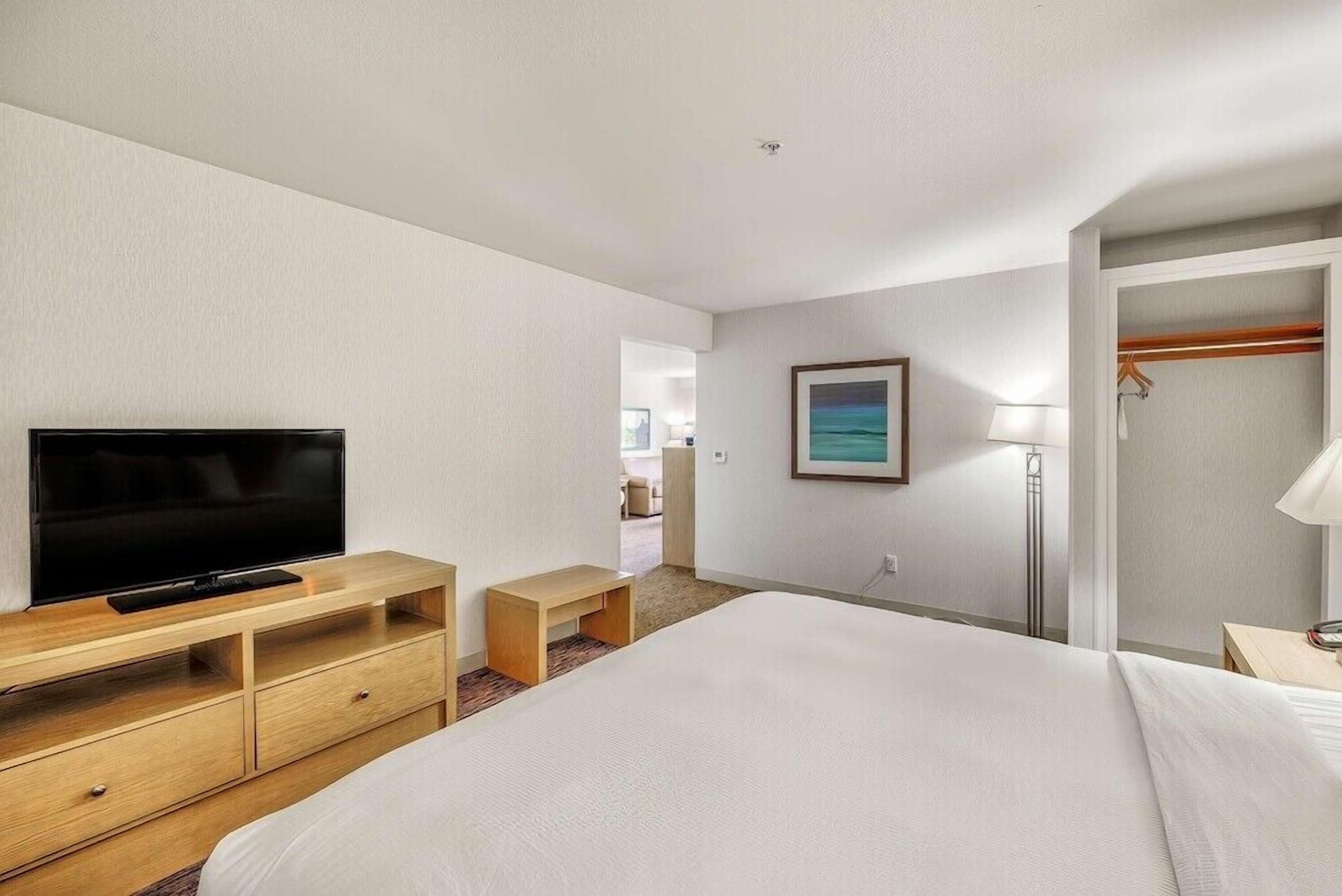 Premium bedding, down comforters, pillowtop beds, in-room safe
