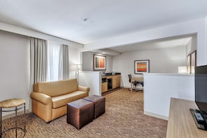 Suite, 1 Bedroom | Living area | 39-inch LCD TV with cable channels, TV, iPod dock