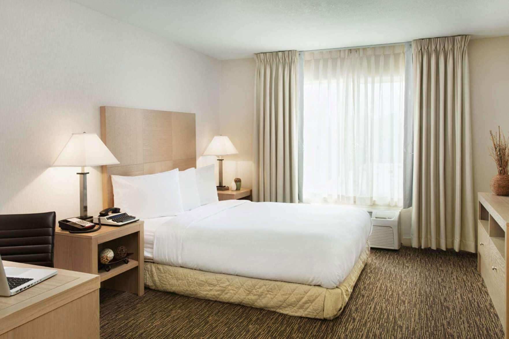 Premium bedding, down comforters, pillowtop beds, in-room safe