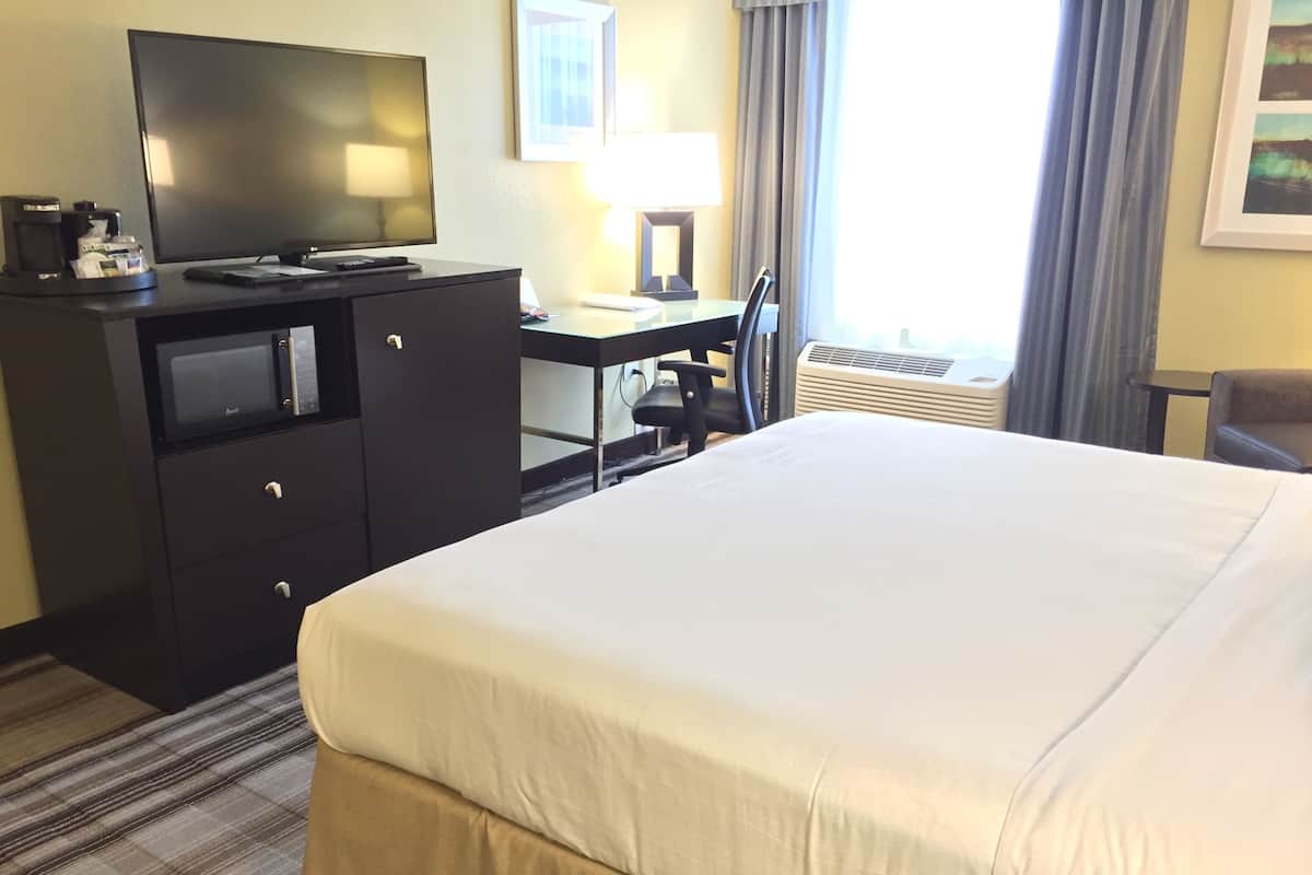 Premium bedding, down duvets, pillow-top beds, blackout curtains