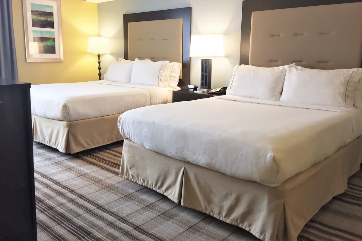 Premium bedding, down duvets, pillow-top beds, blackout curtains
