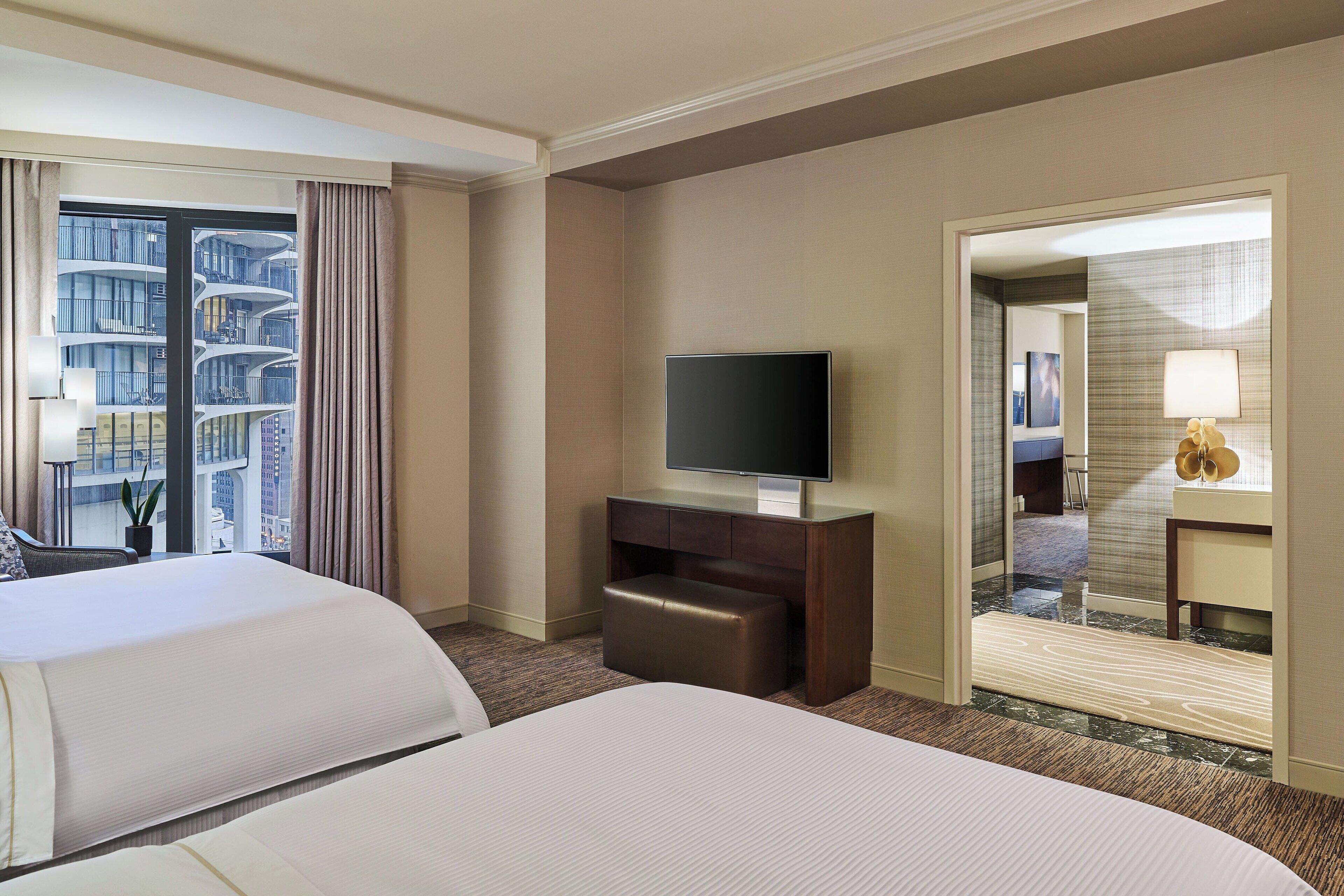 Premium bedding, down duvets, pillow-top beds, in-room safe