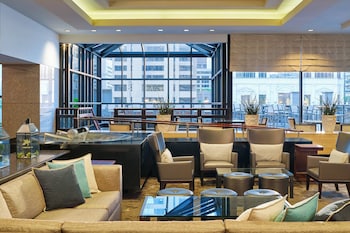 Relax in our spacious lobby with a variety of seating options and natural views. at The Westin Chicago River North