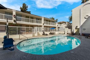 Outdoor pool, pool umbrellas, sun loungers