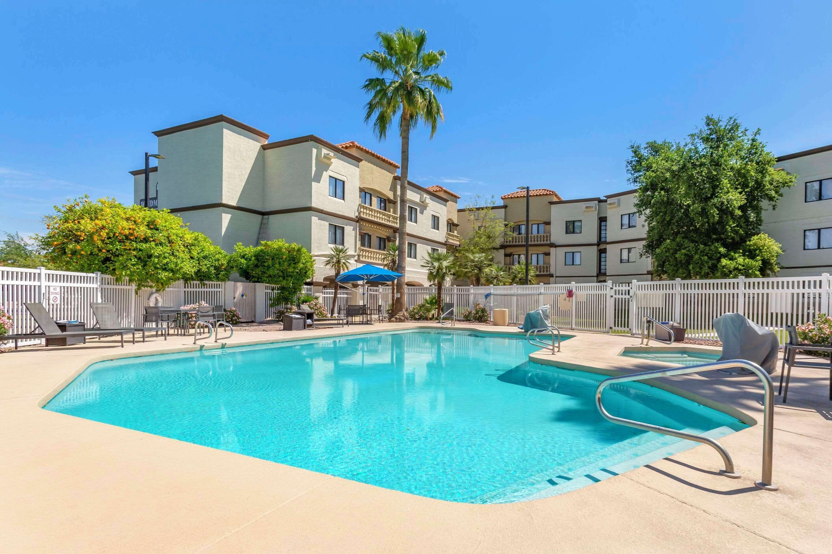 outdoor pool, pool umbrellas, pool loungers