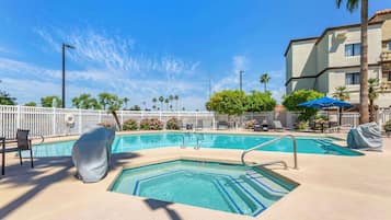 Outdoor pool, pool umbrellas, sun loungers