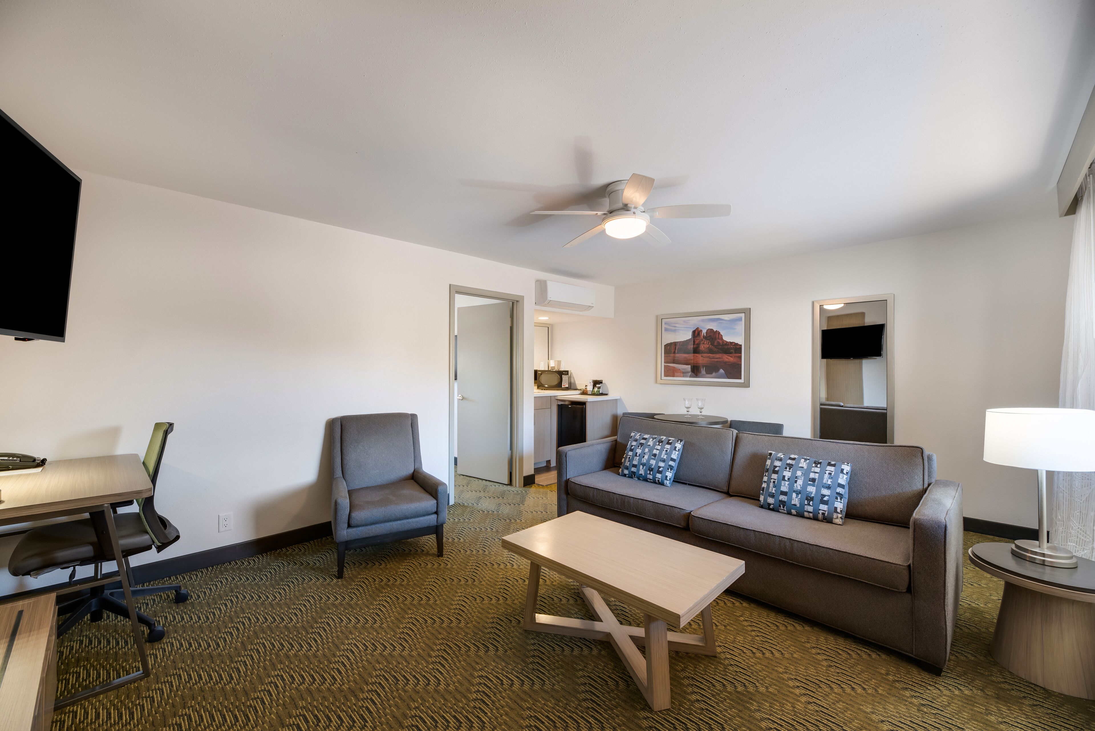 premium suite, mountain view | living area | 40-inch tv with cable channels