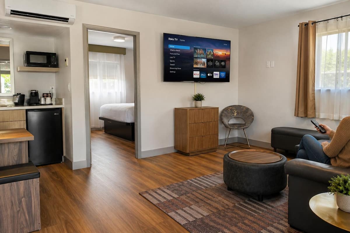 Premium Suite, Mountain View | Living area | 40-inch TV with cable channels