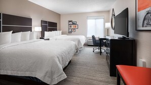 A hotel room with two beds, a desk, a chair, a television, and a window. - Hampton Inn Boulder - Louisville (Louisville)