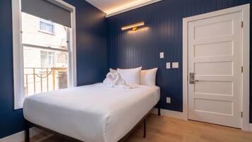 Standard Room, 1 Queen Bed, Private Bathroom | Individually decorated, individually furnished, blackout curtains