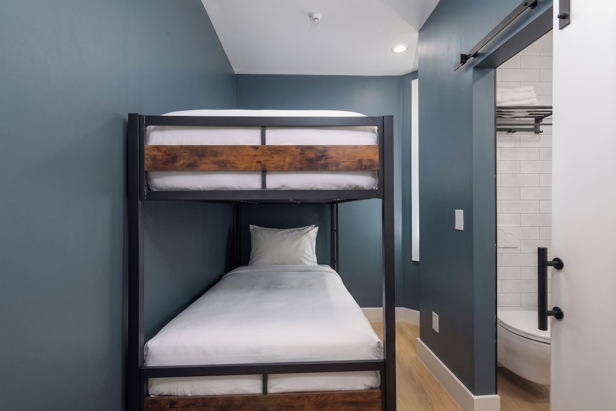 Twin Bunk Beds, Private Bathroom | Blackout drapes, iron/ironing board (on request), WiFi (free)
