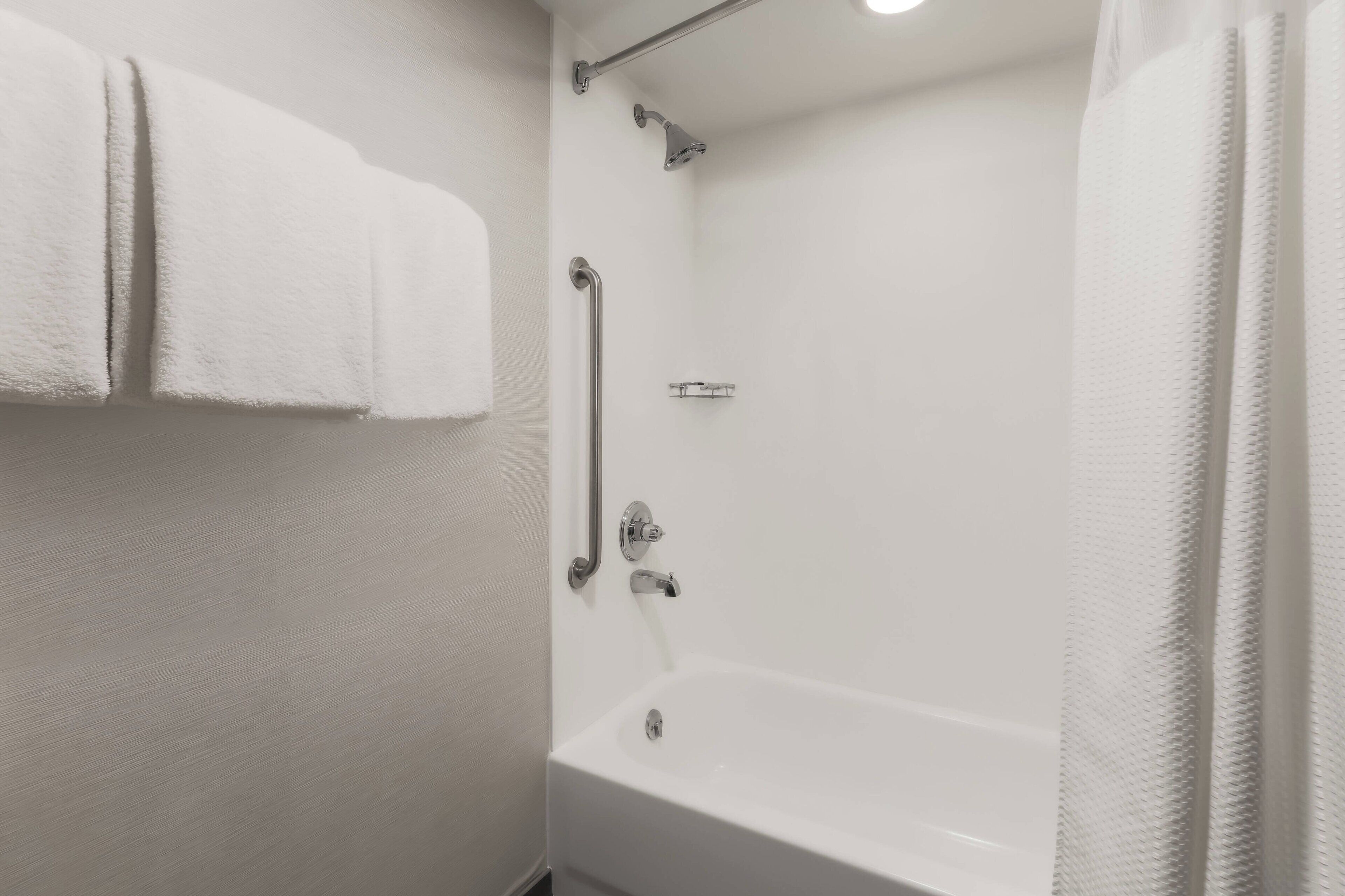 combined shower/bathtub, free toiletries, hair dryer, towels
