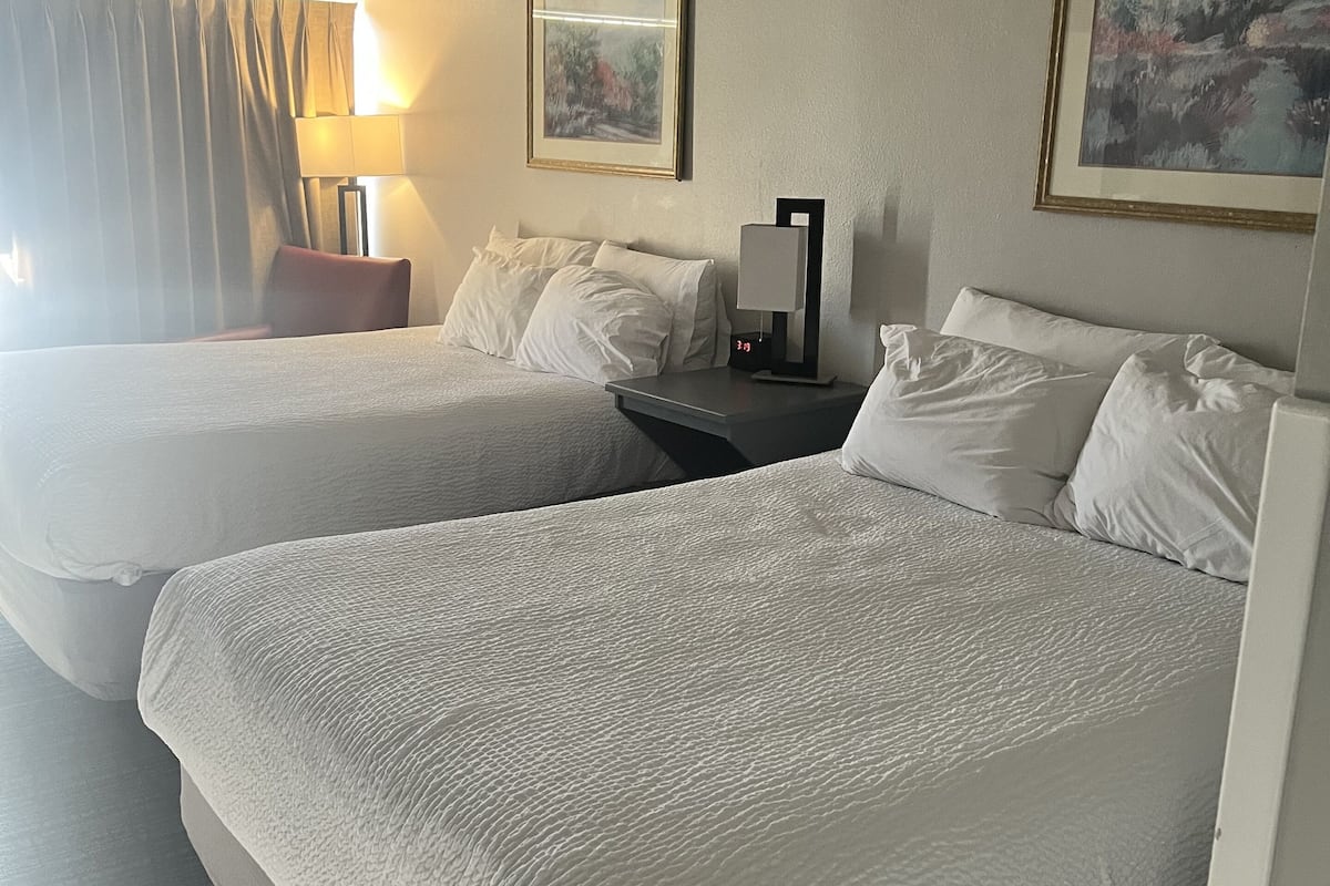 superior double room, 2 queen beds, mountain view | desk, laptop workspace, iron/ironing board, free wifi