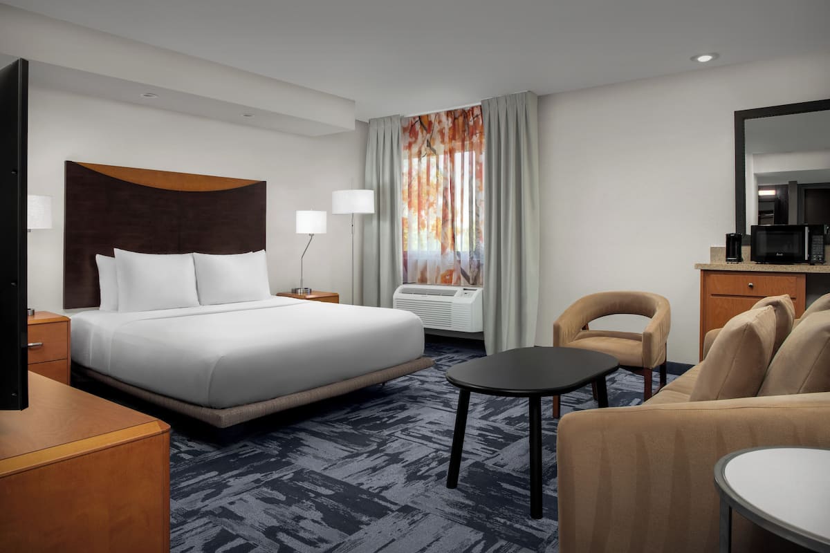 In-room safe, desk, laptop workspace, blackout curtains