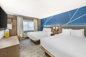 A hotel room with two beds, a desk, a chair, a telephone, and a window with curtains. - Comfort Suites Albuquerque/North Journal Center (Albuquerque)