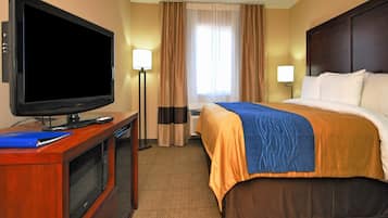 Premium bedding, pillow-top beds, desk, laptop workspace