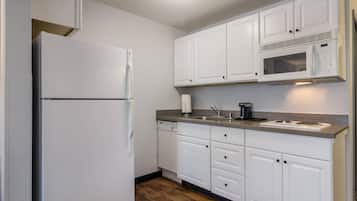 Suite, 1 King Bed, Non Smoking | Premium bedding, desk, blackout drapes, iron/ironing board
