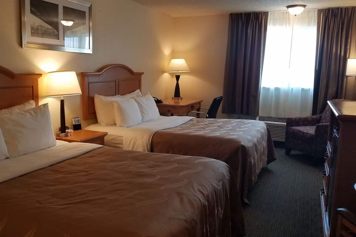 Premium bedding, desk, blackout drapes, iron/ironing board