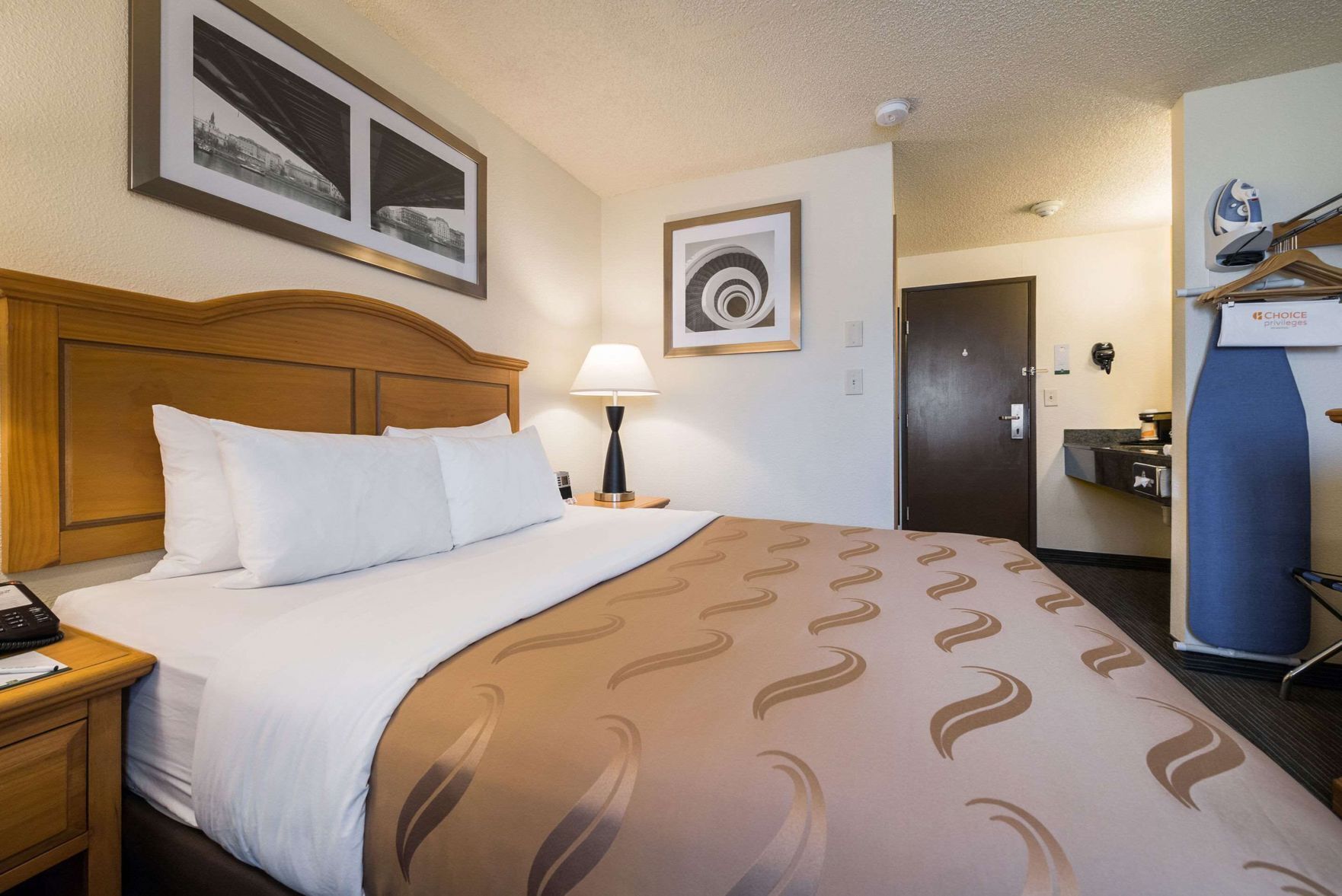 Premium bedding, desk, blackout drapes, iron/ironing board