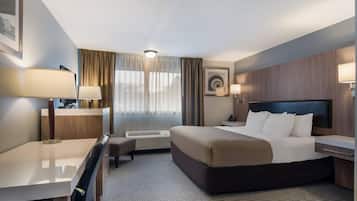 Suite, 1 King Bed, Non Smoking | Premium bedding, desk, blackout drapes, iron/ironing board
